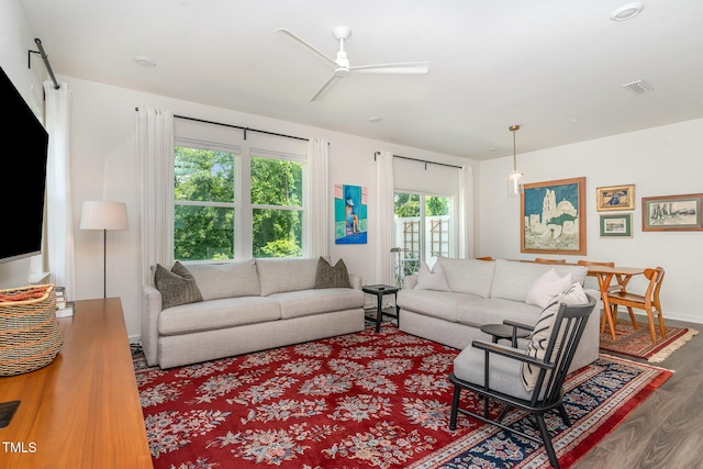 138 Rialto St, Chapel Hill, NC 27516 - living area with baseboards, ceiling fan, wood finished floors, and visible vents