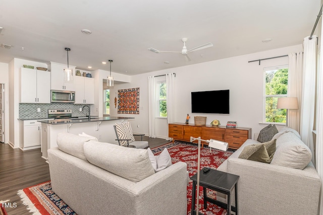138 Rialto St, Chapel Hill, NC 27516 - living area featuring plenty of natural light, ceiling fan, dark wood-style floors, and visible vents