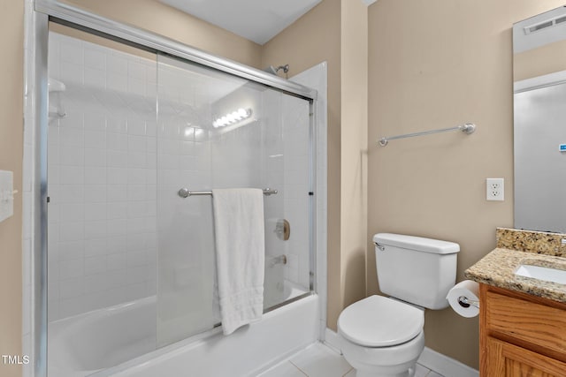 bathroom featuring visible vents, vanity, baseboards, toilet, and enclosed tub / shower combo