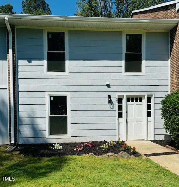 1304 Seaton Rd Unit 24, Durham, NC 27713 - view of front of property with a front lawn
