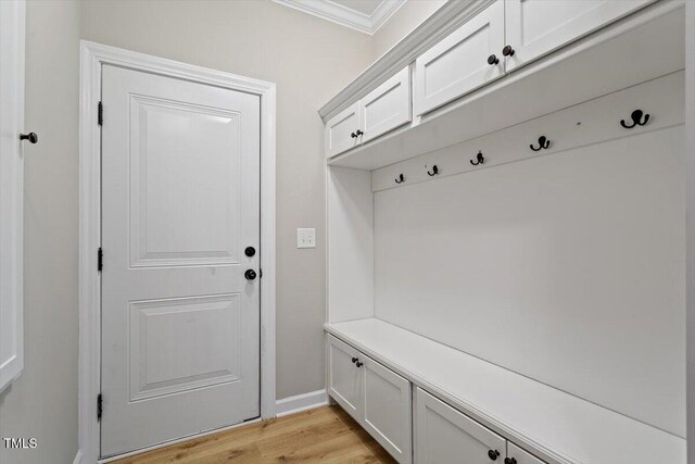 105 Blue Prince Trl, Holly Springs, NC 27540 - mudroom with ornamental molding and light wood-style flooring