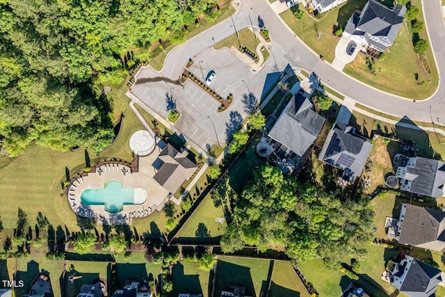 105 Blue Prince Trl, Holly Springs, NC 27540 - aerial overview of property's location with a pool area and nearby suburban area