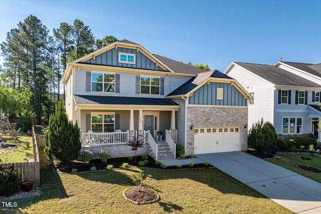 105 Blue Prince Trl, Holly Springs, NC 27540 - craftsman house with board and batten siding, concrete driveway, a porch, stone siding, and a front lawn