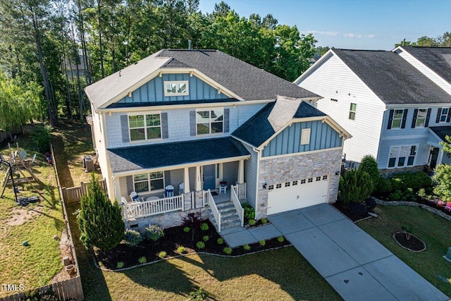 105 Blue Prince Trl, Holly Springs, NC 27540 - craftsman inspired home with board and batten siding, covered porch, stone siding, and concrete driveway