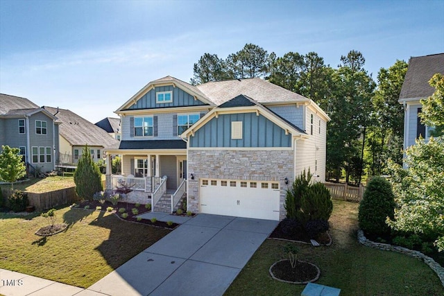 105 Blue Prince Trl, Holly Springs, NC 27540 - craftsman-style home featuring board and batten siding, a porch, stone siding, concrete driveway, and a garage