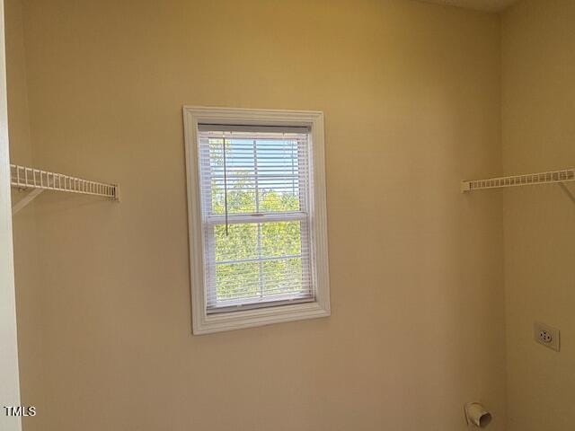 laundry area featuring hookup for an electric dryer and laundry area