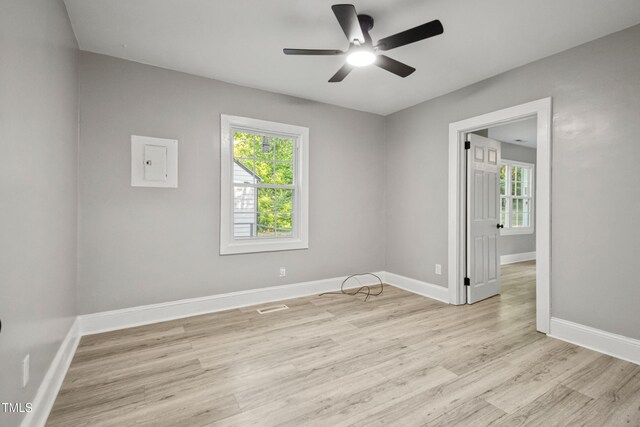 226 S Windsor Dr, Fayetteville, NC 28301 - unfurnished room with baseboards, a ceiling fan, and light wood finished floors