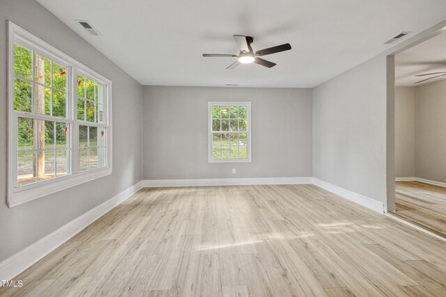 226 S Windsor Dr, Fayetteville, NC 28301 - spare room featuring baseboards, ceiling fan, light wood finished floors, and visible vents