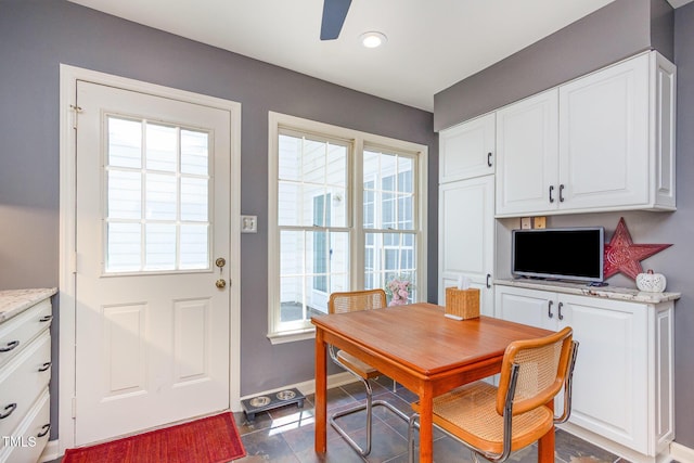 dining room with baseboards, ceiling fan, and recessed lighting