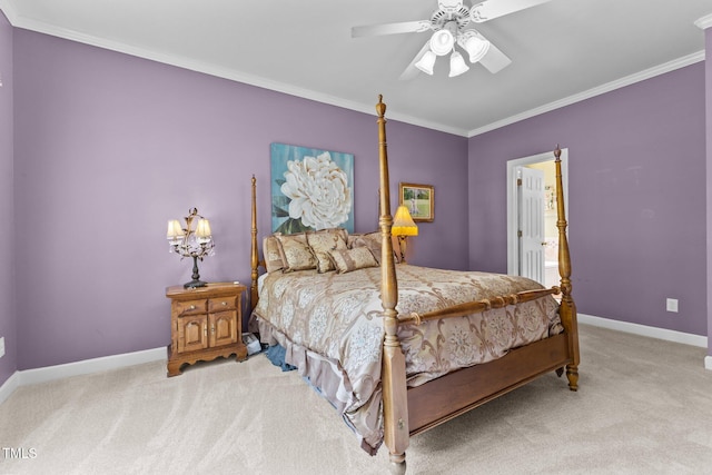 bedroom with crown molding, baseboards, ceiling fan, and light carpet
