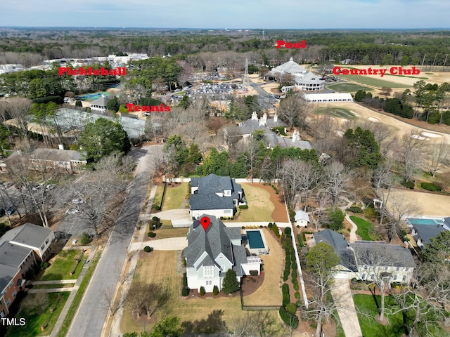 aerial overview of property's location with nearby suburban area