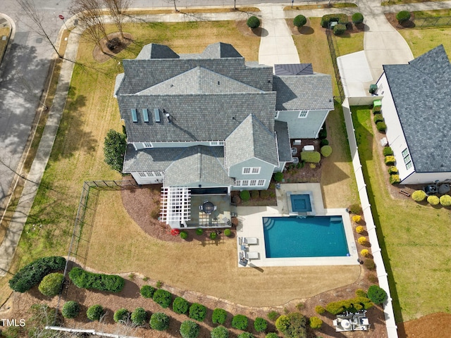 view from above of property featuring a pool