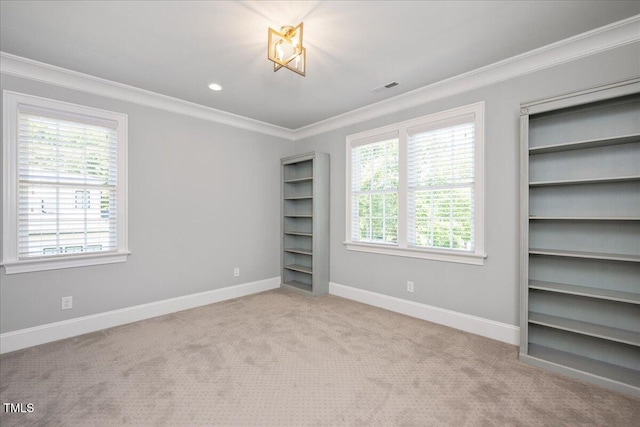 unfurnished bedroom with crown molding, baseboards, carpet flooring, and recessed lighting