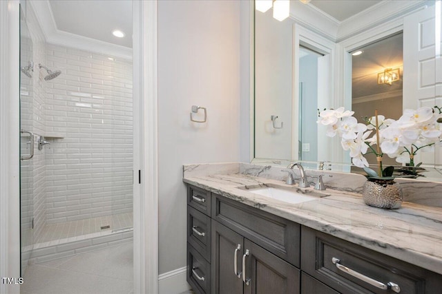 full bathroom featuring crown molding, a stall shower, vanity, tile patterned floors, and recessed lighting