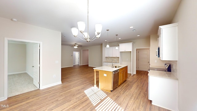 3725 Huntcliff Dr, La Grange, NC 28551 - kitchen with open floor plan, light countertops, tasteful backsplash, a sink, and stainless steel appliances