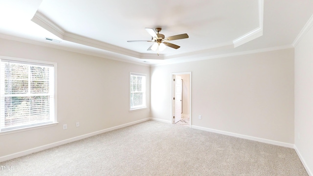 3725 Huntcliff Dr, La Grange, NC 28551 - spare room featuring crown molding, a raised ceiling, plenty of natural light, and visible vents