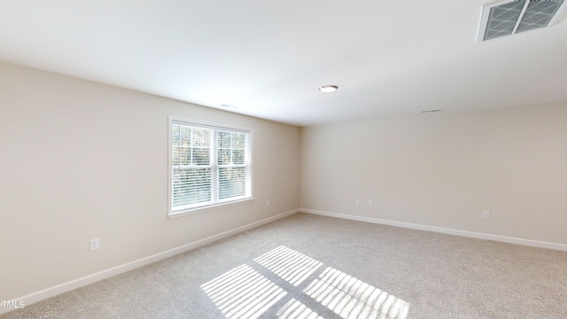3725 Huntcliff Dr, La Grange, NC 28551 - spare room with baseboards, light carpet, and visible vents
