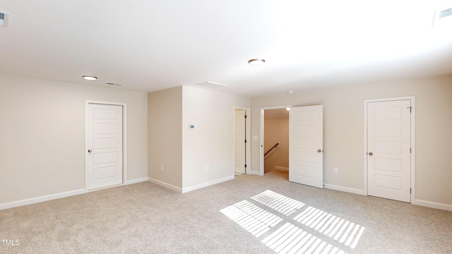 3725 Huntcliff Dr, La Grange, NC 28551 - unfurnished room featuring baseboards, visible vents, and light carpet