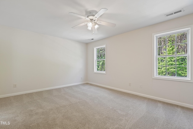 3223 Polite Ln, Raleigh, NC 27610 - carpeted spare room featuring ceiling fan and baseboards