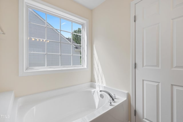 3223 Polite Ln, Raleigh, NC 27610 - bathroom featuring a garden tub