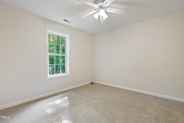 3223 Polite Ln, Raleigh, NC 27610 - carpeted empty room with baseboards and ceiling fan