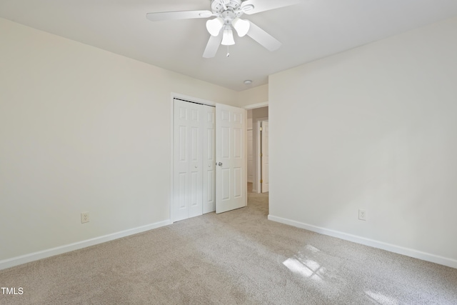 3223 Polite Ln, Raleigh, NC 27610 - unfurnished bedroom with carpet floors, baseboards, a closet, and a ceiling fan