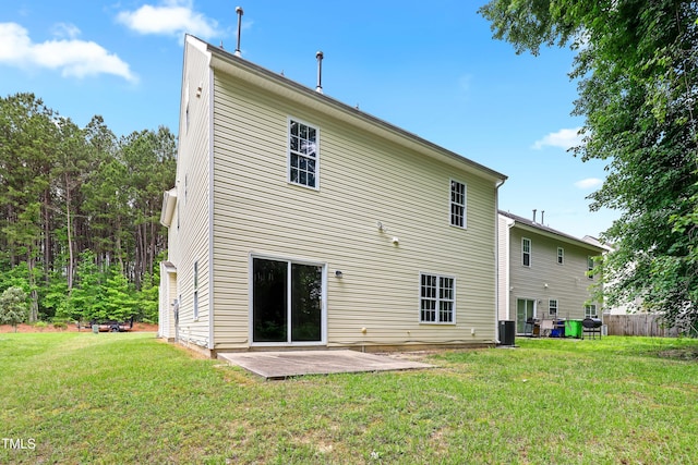 3223 Polite Ln, Raleigh, NC 27610 - rear view of house featuring a patio and central AC unit