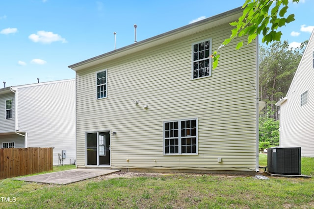3223 Polite Ln, Raleigh, NC 27610 - back of house featuring central AC unit and a patio area