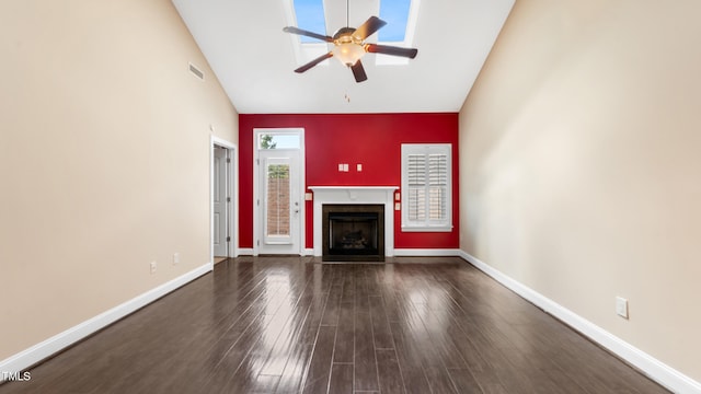 unfurnished living room featuring a ceiling fan, high vaulted ceiling, a fireplace with flush hearth, visible vents, and dark wood-style floors