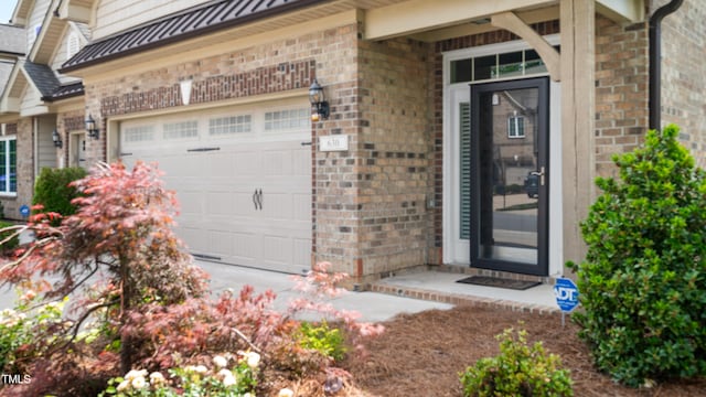 property entrance with brick siding