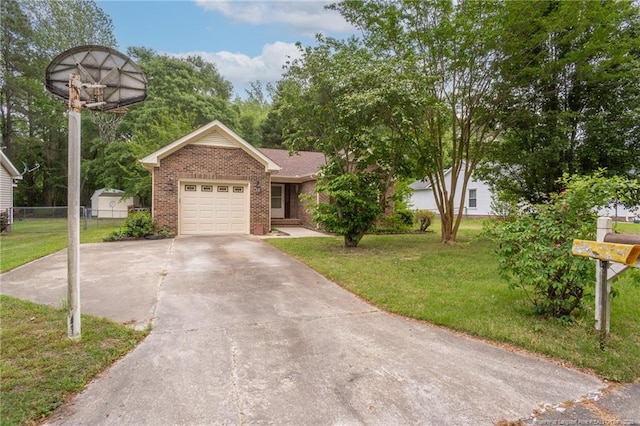 ranch-style house featuring brick siding, a front lawn, fence, and driveway