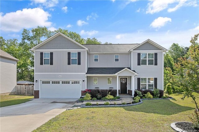 4631 Cedar Pass Dr, Hope Mills, NC 28348 - view of front of property featuring a garage, a front lawn, fence, and driveway