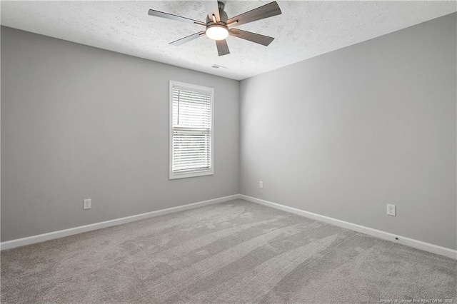 4631 Cedar Pass Dr, Hope Mills, NC 28348 - spare room with baseboards, a textured ceiling, and ceiling fan