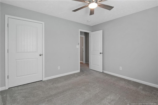 4631 Cedar Pass Dr, Hope Mills, NC 28348 - unfurnished bedroom with baseboards, ceiling fan, and carpet flooring