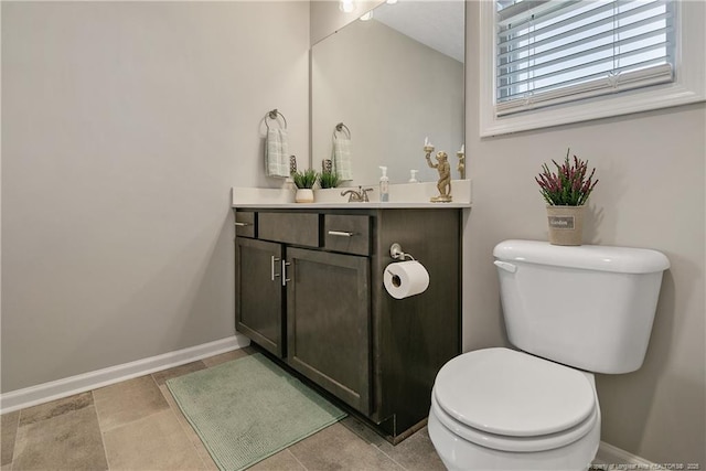 4631 Cedar Pass Dr, Hope Mills, NC 28348 - bathroom featuring toilet, baseboards, and vanity
