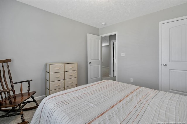 4631 Cedar Pass Dr, Hope Mills, NC 28348 - carpeted bedroom with a textured ceiling and baseboards