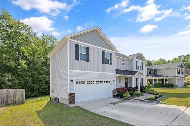 4631 Cedar Pass Dr, Hope Mills, NC 28348 - view of front of home with driveway, a garage, brick siding, fence, and a front lawn