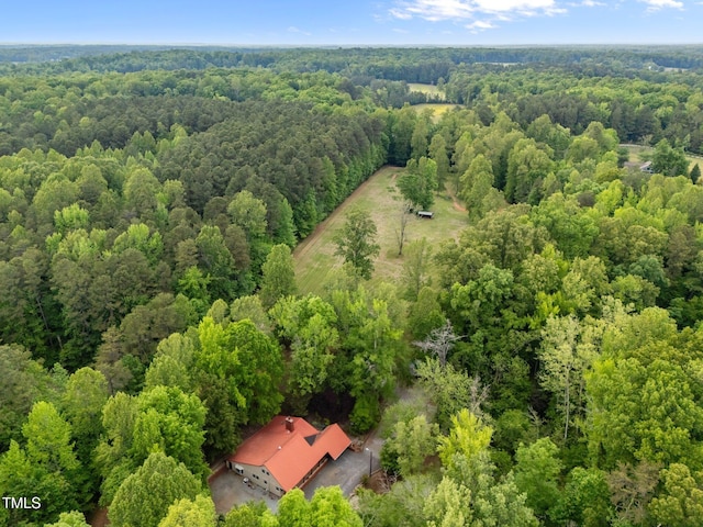 aerial view with a wooded view