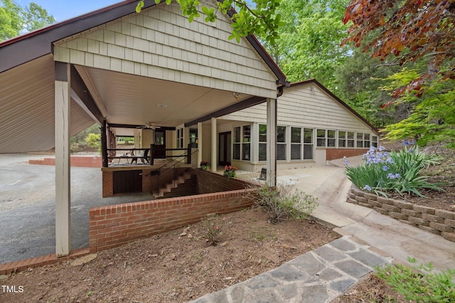 back of property with a patio and a ceiling fan