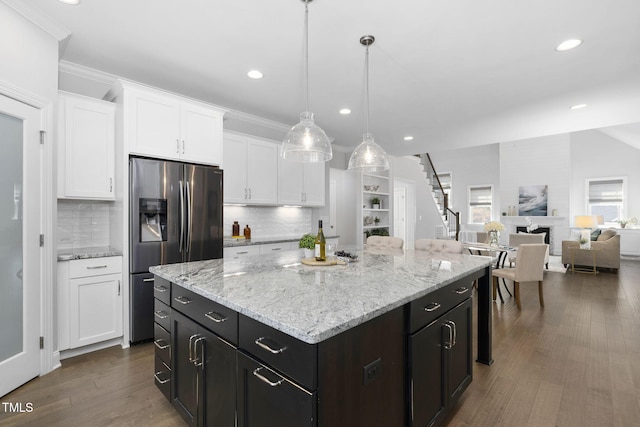 277 High Ridge Ln, Pittsboro, NC 27312 - kitchen with stainless steel refrigerator with ice dispenser, recessed lighting, backsplash, and white cabinets