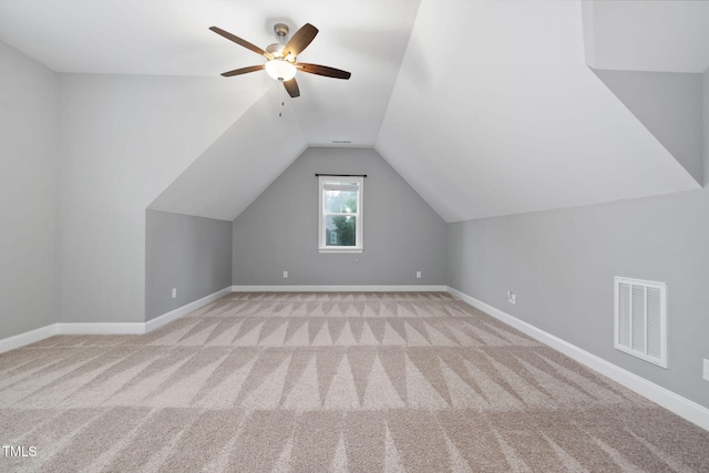 277 High Ridge Ln, Pittsboro, NC 27312 - additional living space with ceiling fan, visible vents, baseboards, lofted ceiling, and carpet flooring