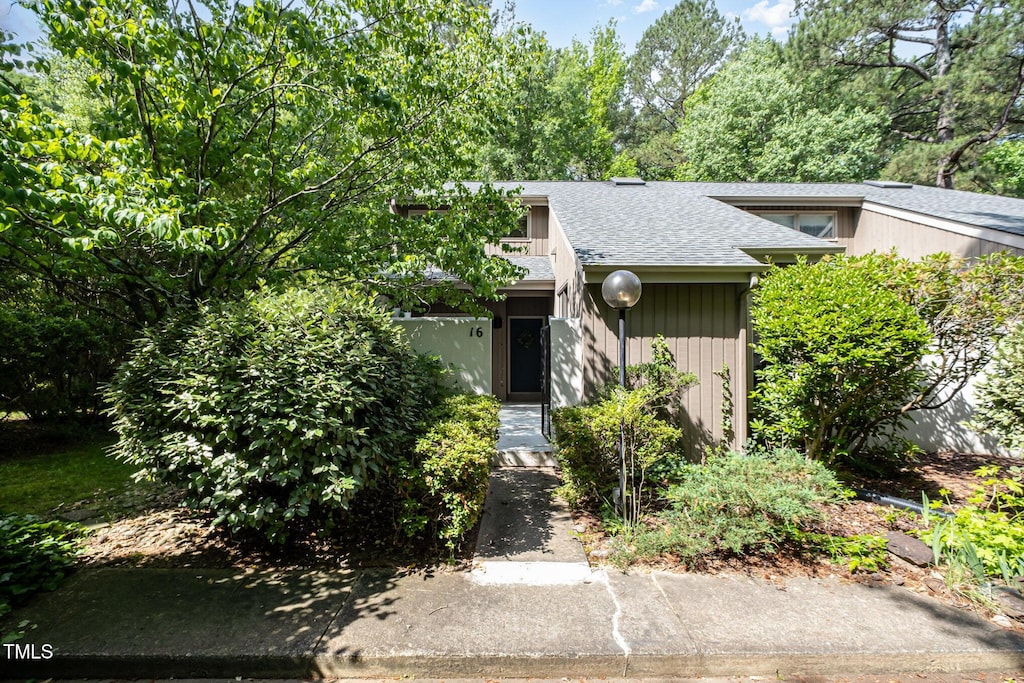 16 Tottenham Ln Unit 16, Chapel Hill, NC 27517 - view of front of house featuring a shingled roof