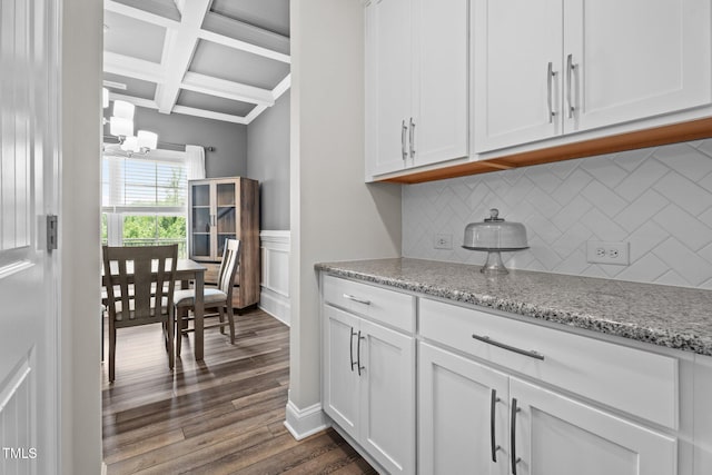 5 Cinnamon Teal Way, Youngsville, NC 27596 - kitchen with coffered ceiling, beamed ceiling, tasteful backsplash, white cabinetry, and dark wood-style floors
