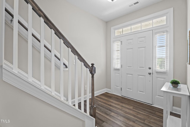 5 Cinnamon Teal Way, Youngsville, NC 27596 - entryway with dark wood finished floors, stairs, and healthy amount of natural light