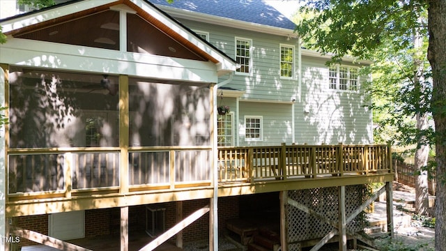 113 Bergeron Way, Cary, NC 27519 - rear view of house with a deck, a sunroom, and roof with shingles