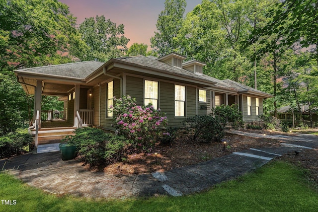 prairie-style home featuring a porch