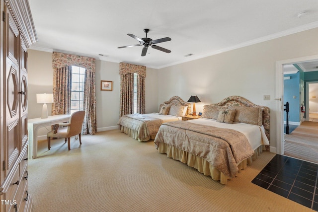bedroom with light carpet, crown molding, baseboards, and ceiling fan