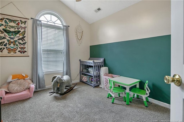 rec room featuring ceiling fan, carpet floors, baseboards, lofted ceiling, and visible vents
