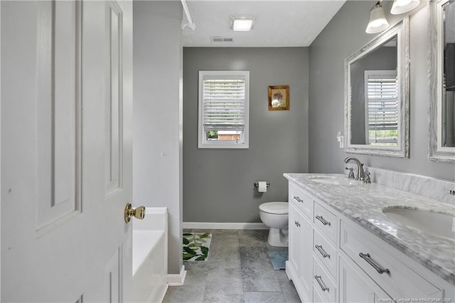 full bath featuring baseboards, a sink, visible vents, and toilet