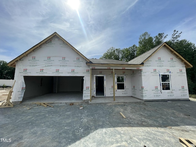 445 Olivia Crossing Ct Unit 22, Four Oaks, NC 27524 - unfinished property with an attached garage